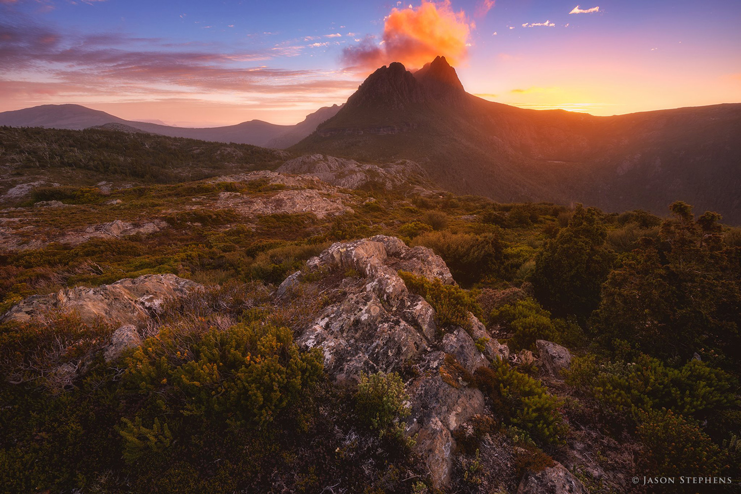 photograph of Cradle Mountain doing its best volcano impersonation!