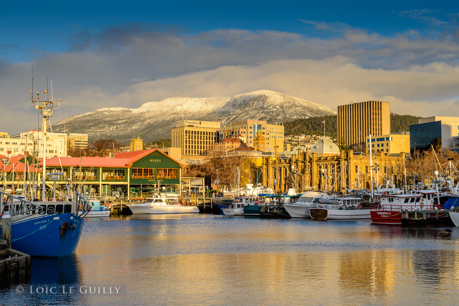 photograph of Hobart harbour with Mt Wellington under the snow