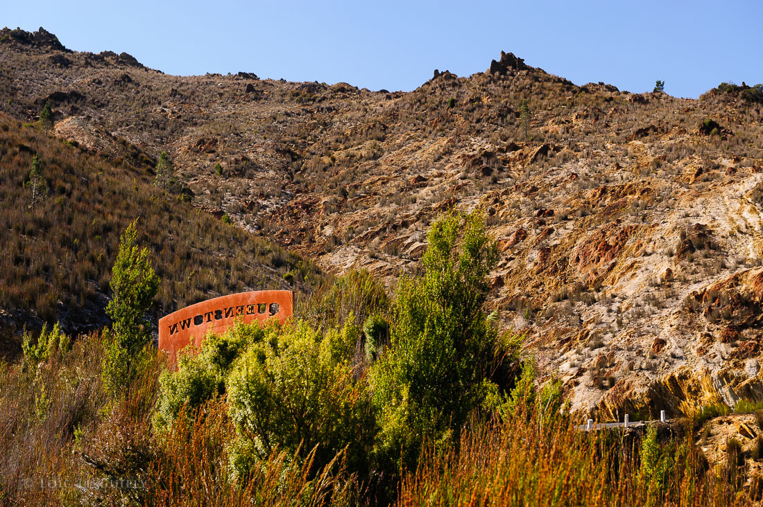 photograph of Metal sign above Queenstown