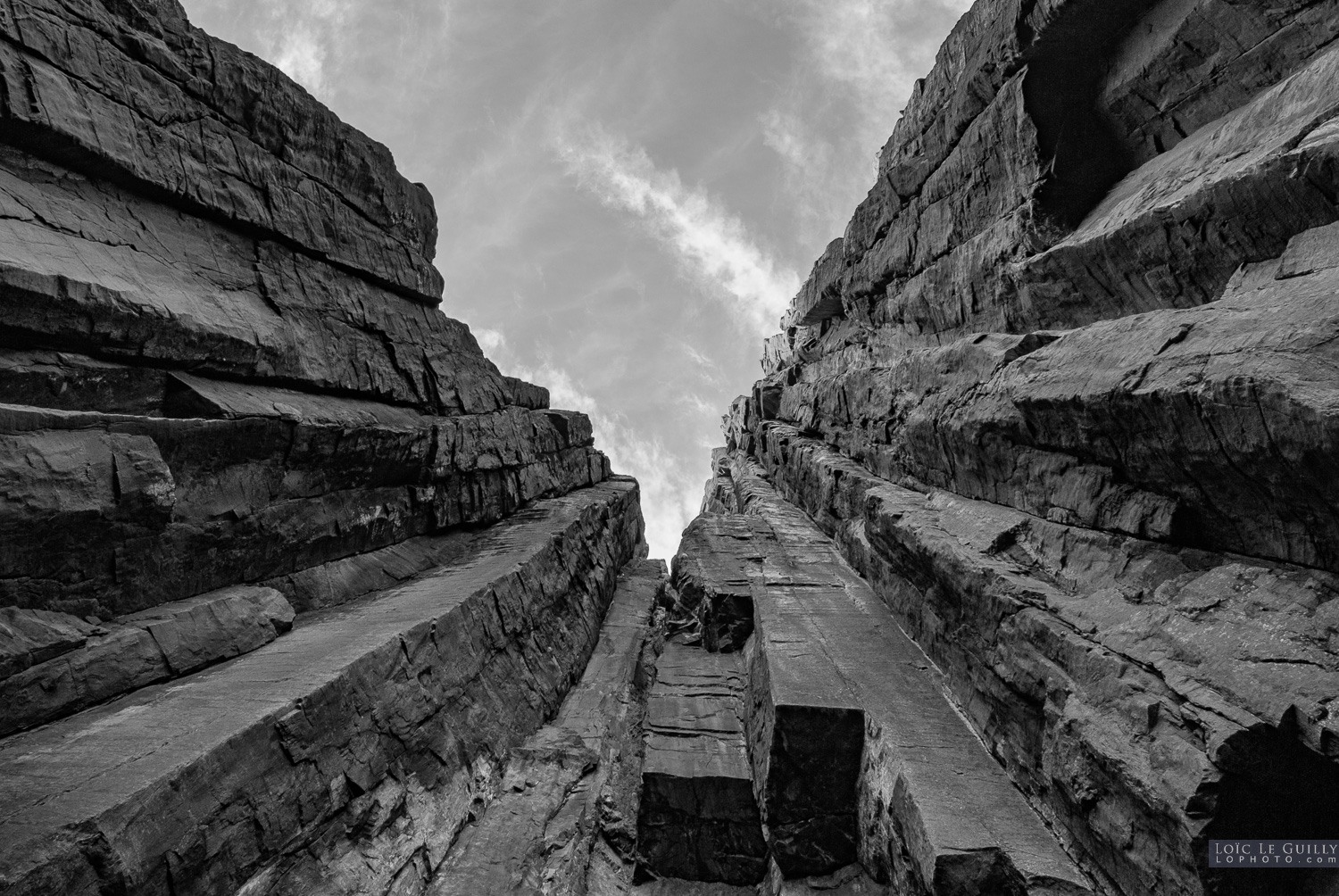 photograph of Looking up the dolerite columns of Cape Pillar